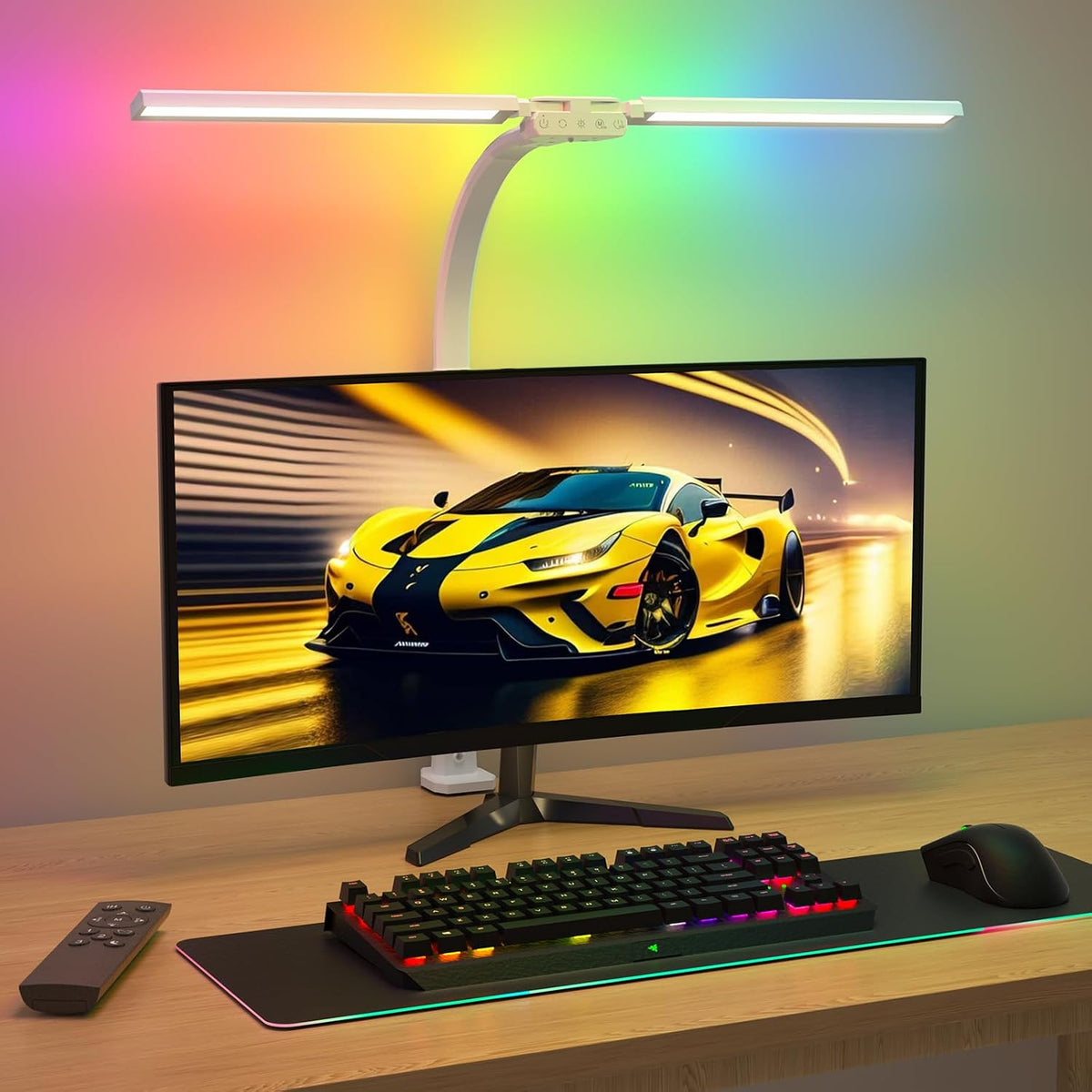 SIBRILLE double-head clamp desk lamp: white RGB version illuminating a gaming desk.