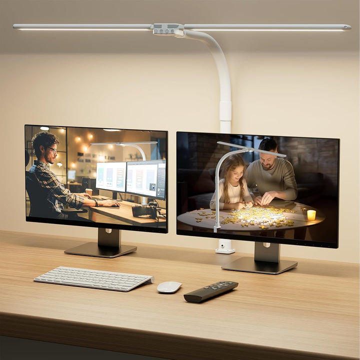 SIBRILLE double-head clamp desk lamp: standard white version above two monitors.
