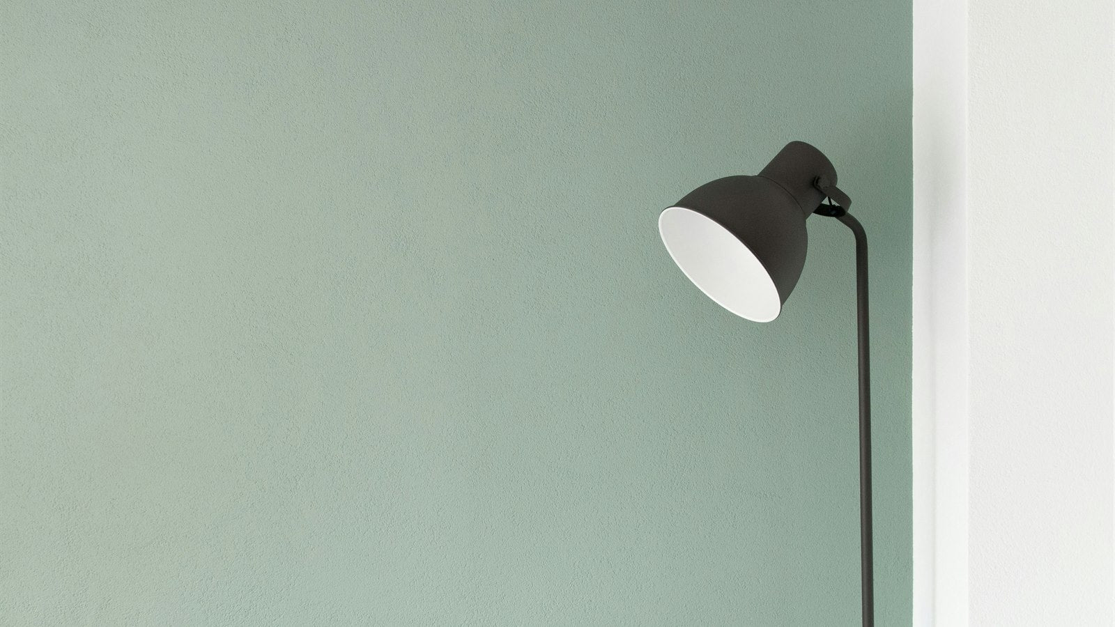 Slim LED floor lamp for a compact apartment living room