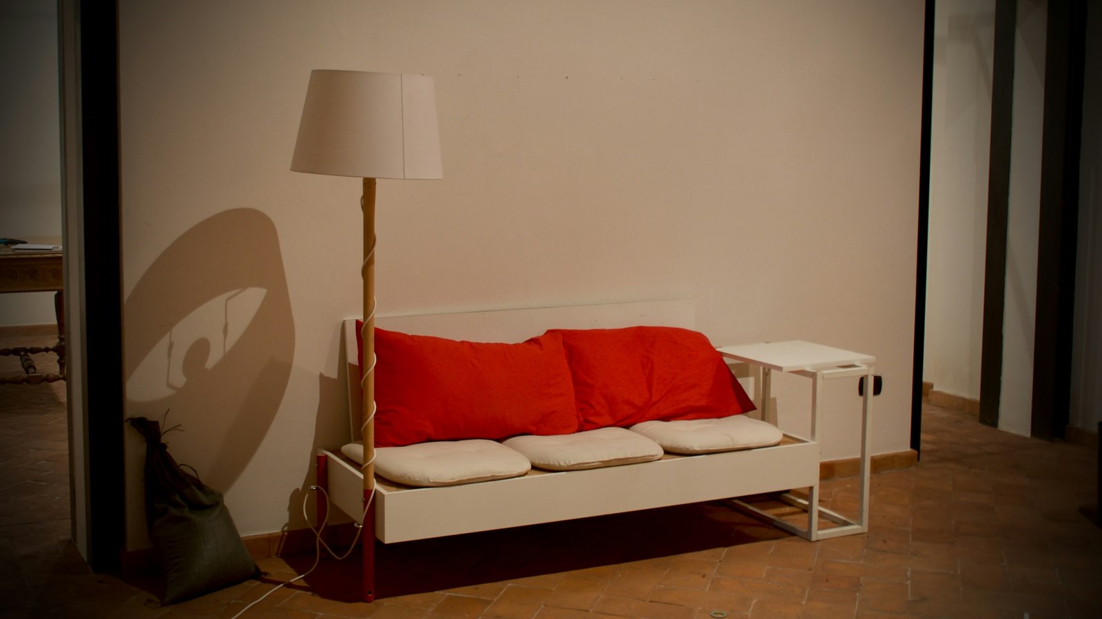 Modern floor lamp styled in a small studio apartment