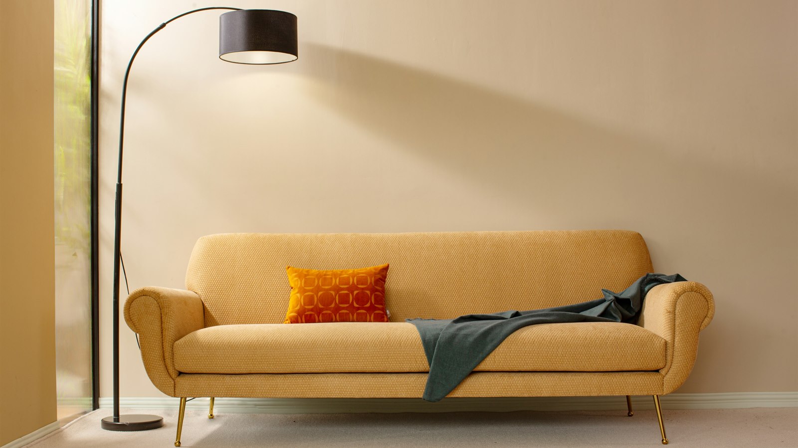 Modern LED floor lamp creating ambient living room light