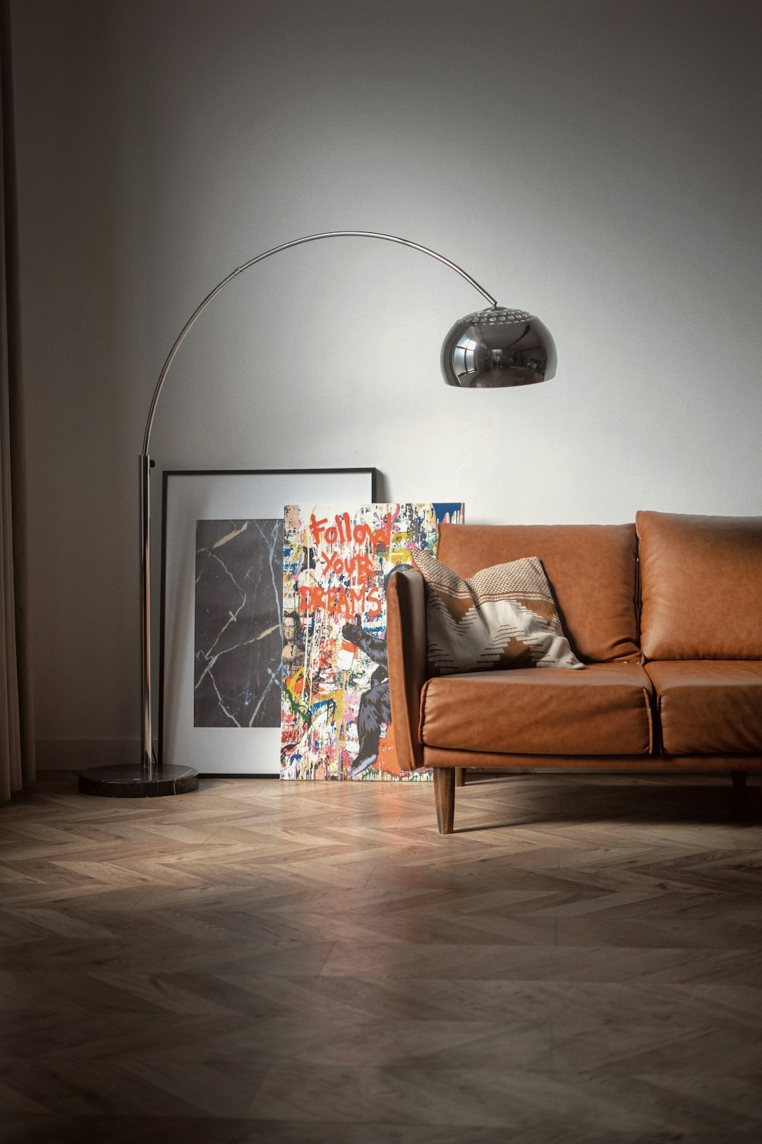 Living room with a sofa and modern floor lamp